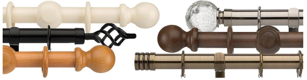 a superb collection of wood and metal curtain poles,